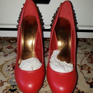 Red statement heels